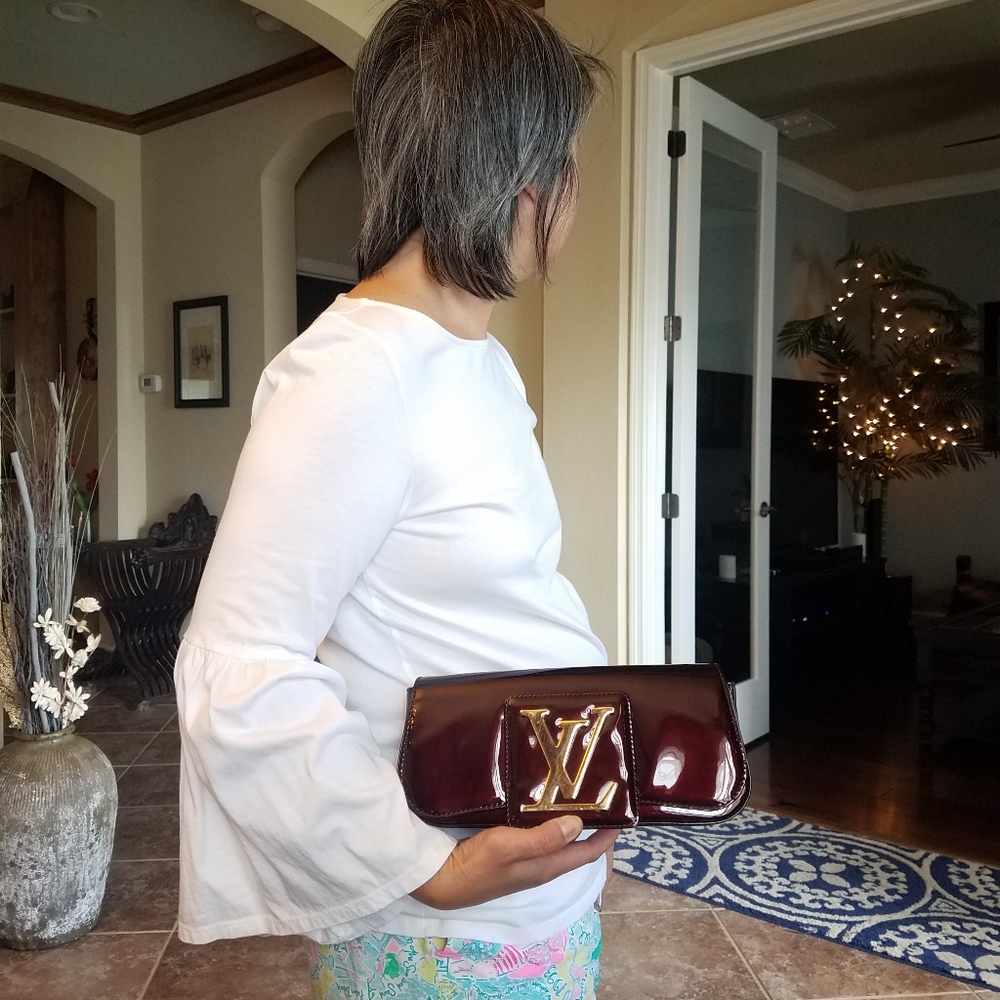 SOLD@!. Louis Vuitton Sobe Amarante Patent Leather